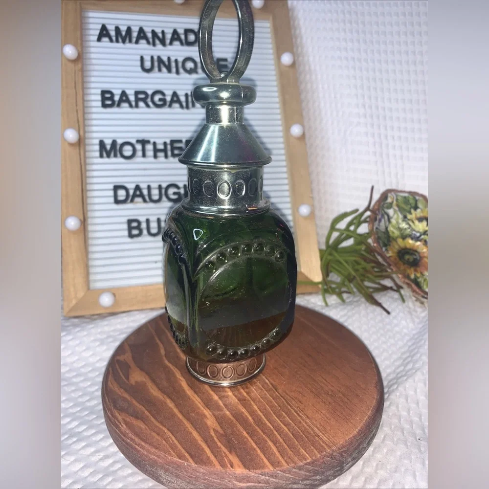 Unique vintage Avon collectible bottle designed in the shape of a lantern.